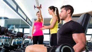Dumbbell man at gym workout fitness weightlifting