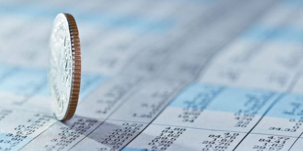 15840549 - coins on stock index background